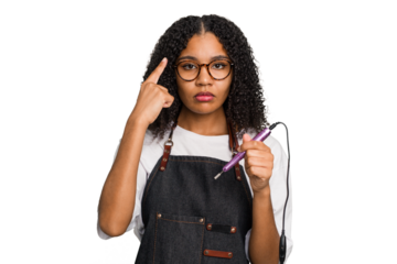 Young african american manicurist woman holding an electric file drill isolated pointing temple with finger, thinking, focused on a task.
