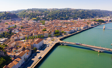 Fototapeta na wymiar Picturesque view from drone of river Rhone and French city of Vienne in summer, Isere department.