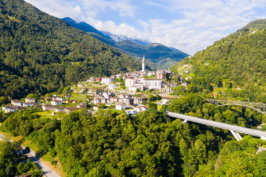 Scenic aerial view of Swiss hamlet of Intragna in Centovalli valley in Alpine highlands in summertime, Locarno district, canton Ticino .