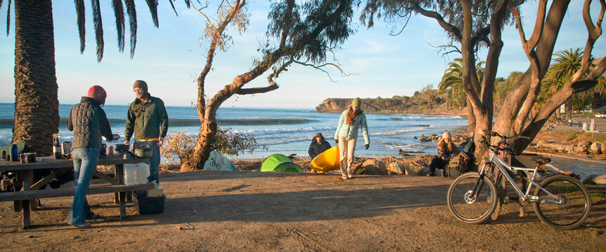 A Group Of Young Adults Camping At El Capitan State Beach.