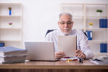 Old male employee and too much work in the office