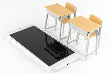 スマートフォンと玩具の勉強机.スマホ教室のイメージ