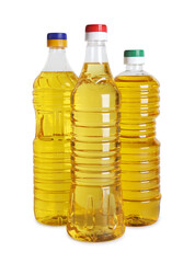 Bottles of cooking oil on white background