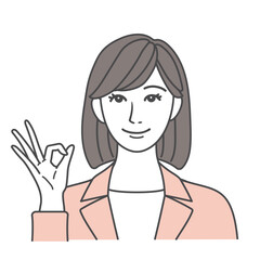 OKサインをするスーツ姿の女性 ピンク