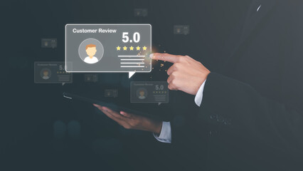 Customer service and satisfaction concept, businessman touching 5 stars icon showing happy and to provide service satisfaction, very impressive rating, evaluation and review.