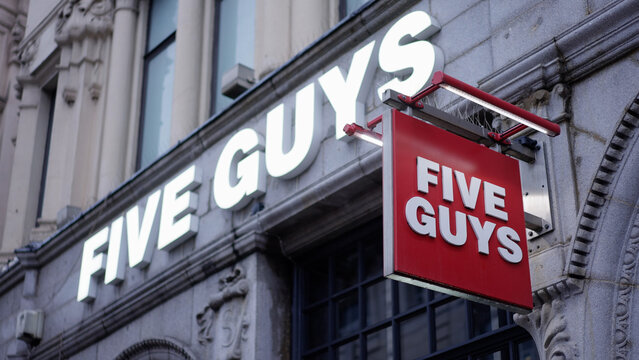 Five Guys burger restaurant in London - LONDON, UNITED KINGDOM - DECEMBER 20, 2022