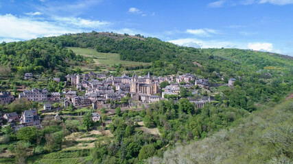 Fototapeta na wymiar View of a valley with forest and hills near Conques, Aveyron, France