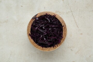 Tasty red cabbage sauerkraut on table, top view