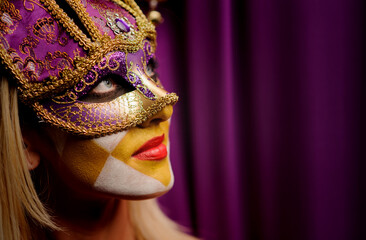 close up portrait of beauty young woman in venice mask