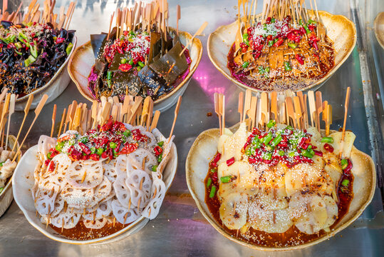 Boboji Sichuan Dish - spicy cold skewer snack close-up view in jinli ancient street, Chengdu, Sichuan province, China
