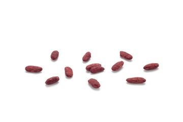 Close-up of red yeast rice on white background