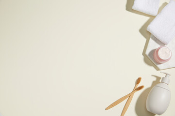 composition of bathroom object on light beige background. simple, copy space. top view.