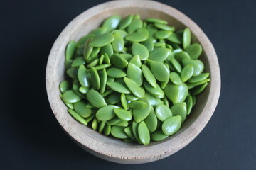 lots of lamtoro seeds in a bowl