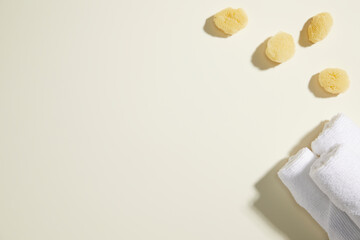 composition of bathroom object on light beige background. simple, copy space. top view.