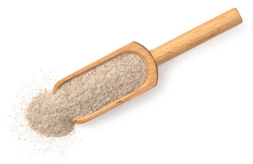 Raw rye flour in the wooden scoop, isolated on white background, top view.