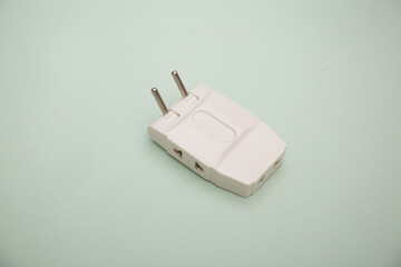 electric splitter isolated on a green background
