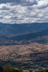 Beautiful view of the large Mexican city of Oaxaca from Monte Alban. View of the endless mountain peaks.