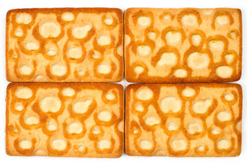 Texture of rectangular biscuits. Cookies on a white background.