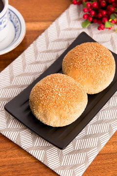 Kompyang bread or Kompia or Guang Bing, a typical Chinese bread that is popular in Indonesia, both filled with meat and empty. Its signature with a sprinkling of sesame on top