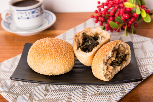 Kompyang bread or Kompia or Guang Bing, a typical Chinese bread that is popular in Indonesia, both filled with meat and empty. Its signature with a sprinkling of sesame on top