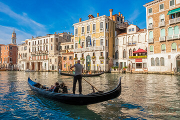  Venetian Gondolierof Venice Italy background - obrazy, fototapety, plakaty