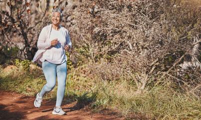 Fitness, happy and senior woman running in nature for cardio, morning motivation and marathon training in Australia. Freedom, wellness and elderly runner with a smile for outdoor exercise in a park