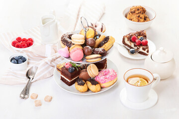 Afternoon tea stand with sweet treats.
