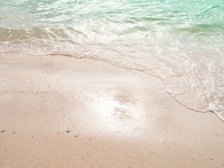 Wave Sea on Sand Beach Background,White Foam Water Blue Shore at Coast,Beautiful Seascape Smooth Nature Landscape,for Tourism Vacation Travel Tropical Season in Holidays,Spash Fresh Ocean Island.