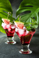Watermelon alcoholic or non-alcoholic drink, mojito cocktail with mint and ice