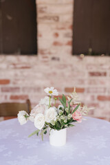 white flowers in vase , wedding ceremony