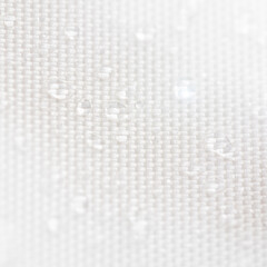 Waterproof fabric with water drops.