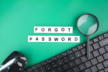 mouse, laptop keyboard and magnifying glass with alphabet letters of the word forgot password. the concept of forgotten password. the concept of inaccessibility - obrazy, fototapety, plakaty