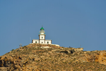 Fototapeta na wymiar Old lighthouse on Santorini island, Greece
