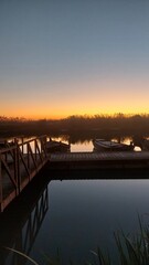 Obraz premium sunset over the river