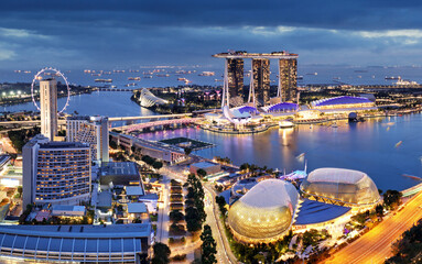 Aerial view of Singapore business district and city at twilight in Singapore, Asia