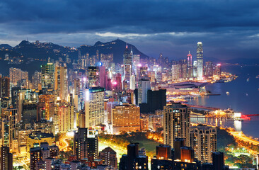 Hong Kong night view of skyline with reflections at victoria harbor