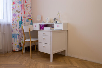 Interior of a children's room for a girl. Desk