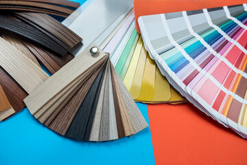 different sepmler color palettes arranged with a fan on the table isolated.