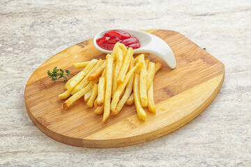 French fried potato over board