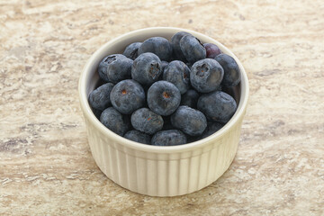 Sweet ripe blueberry heap in the bowl