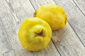 Fresh ripe yellow quince fruit