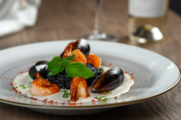 Fototapeta na wymiar seafood, mussels, salmon on a white plate