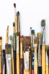 Close-up, brushes for drawing on a white background.