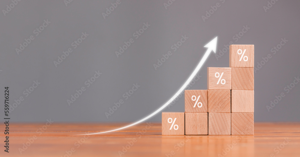 Poster wooden blocks with icon percentage symbol and arrow pointing up with concept for interest rate finan
