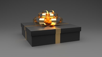 Black gift box with golden bow ribbon