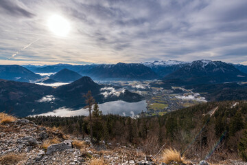 Areal view over Ausseerland, Alktaussee in Winter with view to the dachstein glacier, photographed from mountain Loser, Styria, Austria