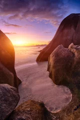 Foto op Plexiglas Anse Source d'Argent beach in the Seychelles at sunset © Fyle