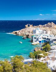 Obraz premium Beach and fishing village of Firapotamos on Milos island, Greece
