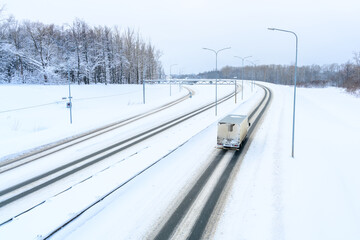 A semi-trailer truck, semitruck, tractor unit and semi-trailer to carry freight.