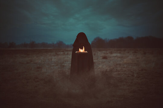 Black wizard with magical book